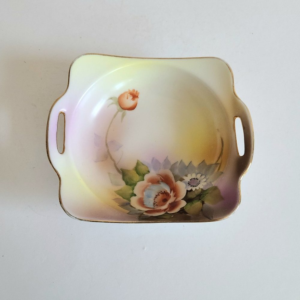 Noritake Japan hand painted porcelain trinket dish with floral design.